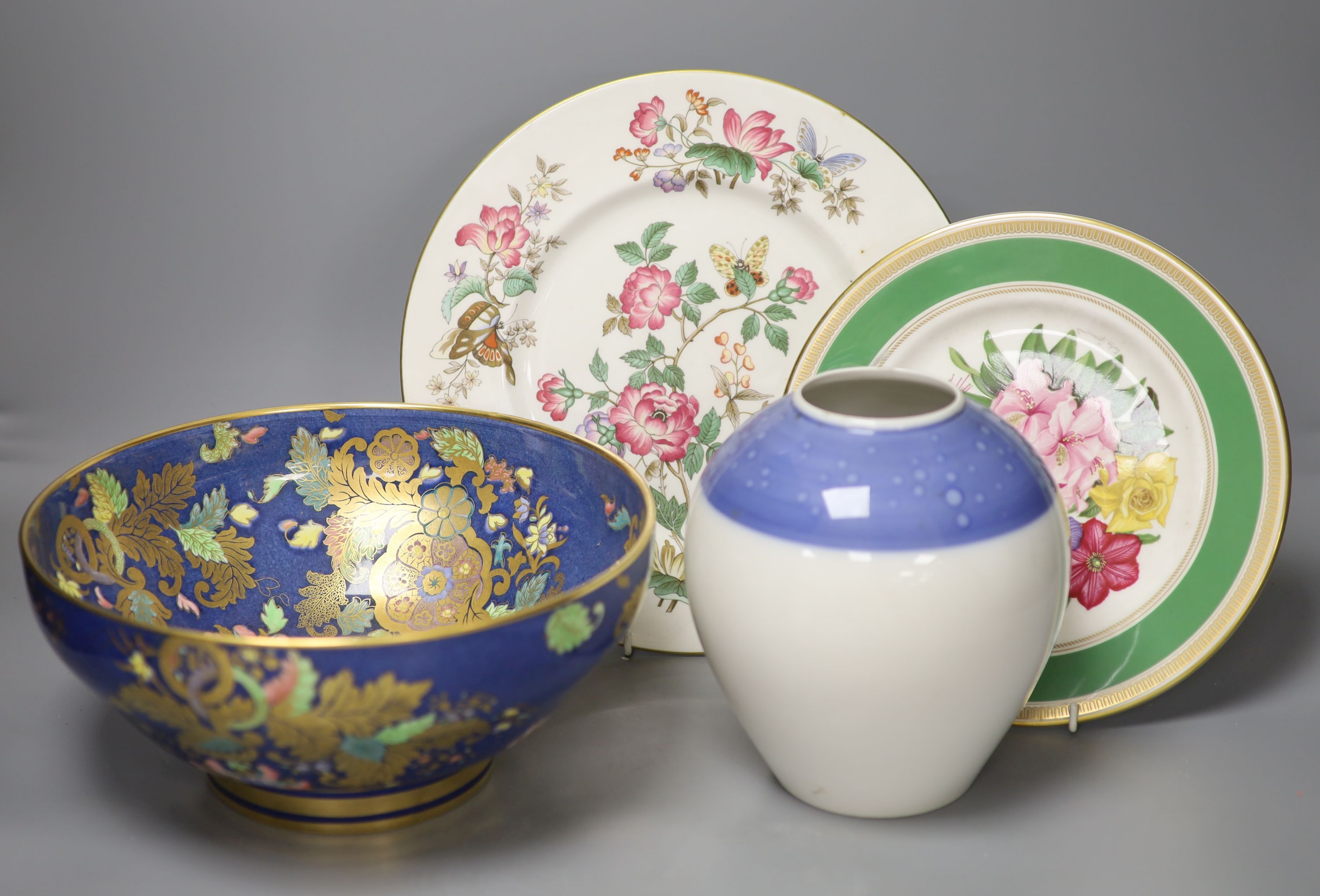A Spode blue ground bowl, diameter 26cm, two cabinet plates painted with a floral bouquet and a Berlin KPM blue and white vase (4)